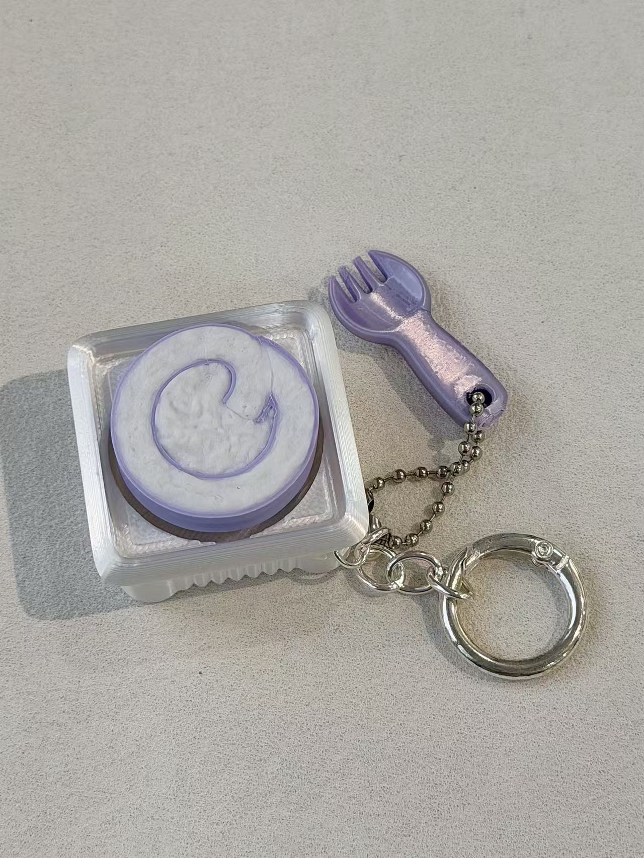 Taro Swiss Roll Click 3D Printed Fidget Keychain
